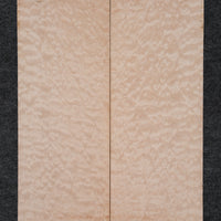 Highly figured maple mandolin soundboard with a striking quilted pattern and light golden hue, ideal for custom instrument construction.