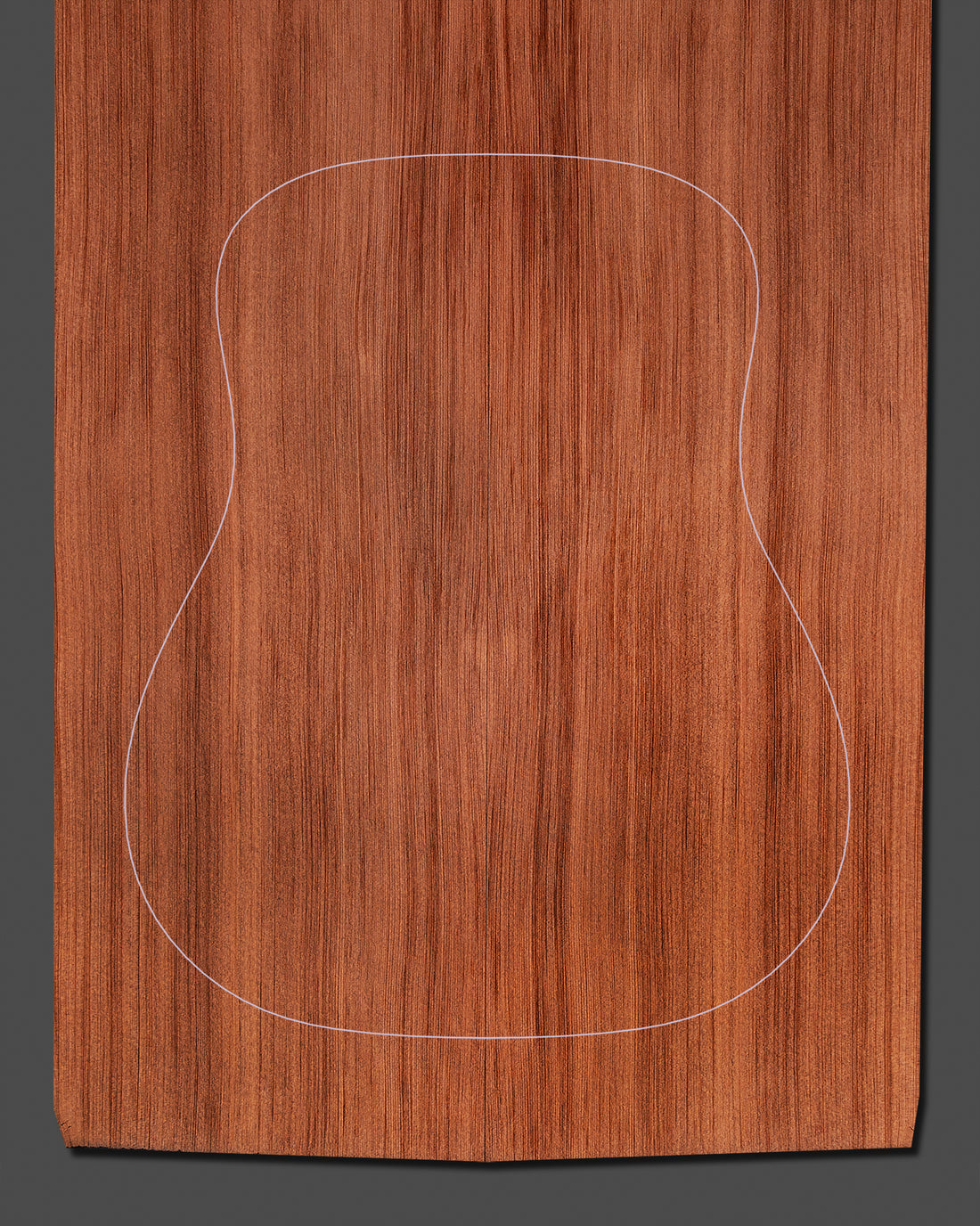 Redwood soundboard with a deep, warm color and straight grain pattern, offering superior resonance and tonal complexity.