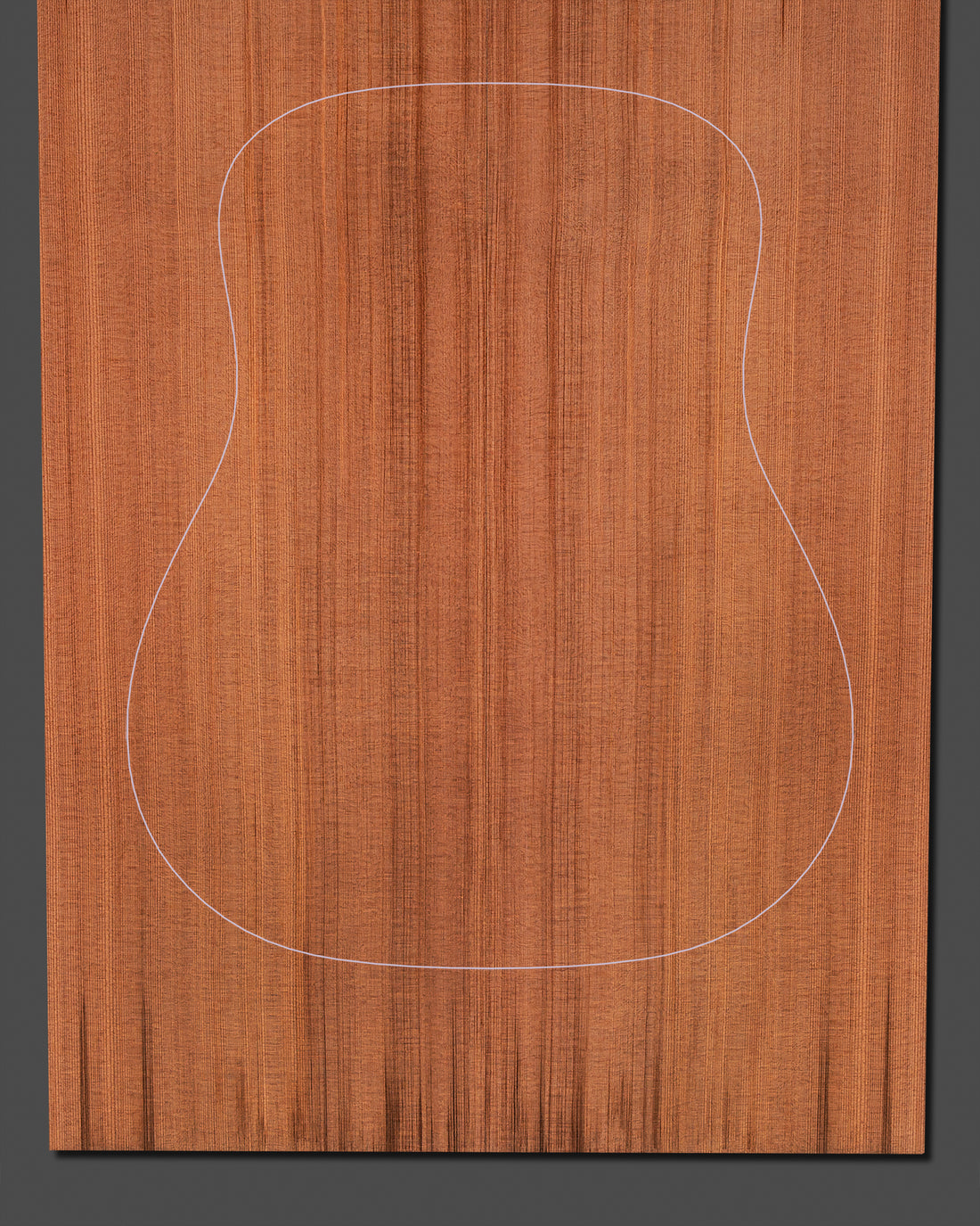 Richly colored redwood guitar top with elegant vertical grain, designed for dynamic sound projection and warmth.