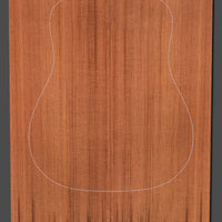 Richly colored redwood guitar top with elegant vertical grain, designed for dynamic sound projection and warmth.