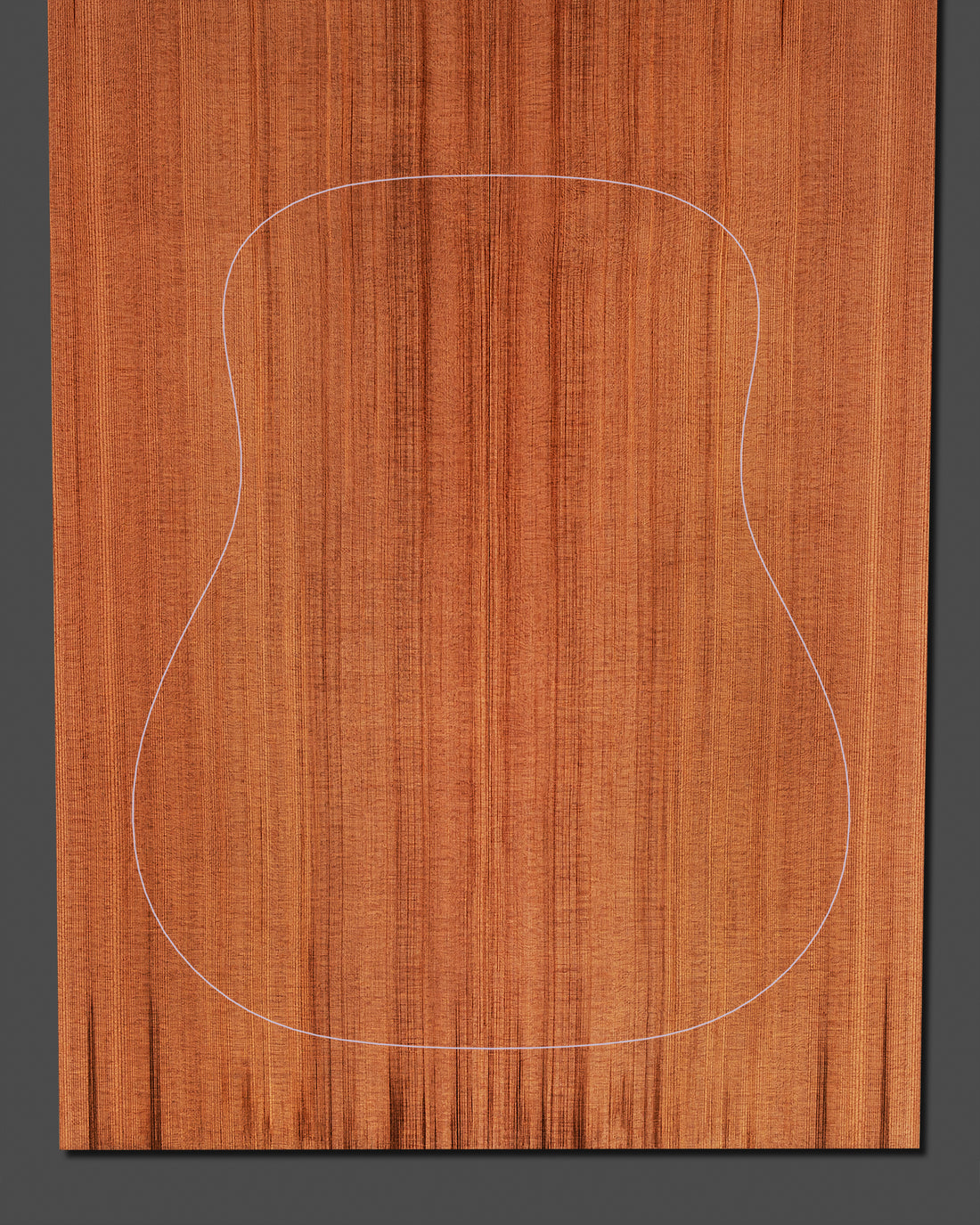 Redwood guitar soundboard with straight grain and marked outline, offering rich tonal warmth and sustain