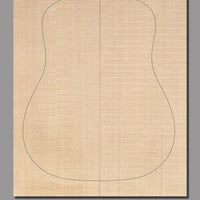 Slipmatched Sitka spruce soundboard, showcasing gentle figuring and a naturally blended aesthetic.