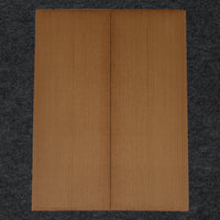 Thermally treated mandolin soundboard with a warm, caramel tone and straight grain, enhancing resonance and stability for superior acoustic performance.