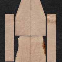 Quilted maple ukulele set with light creamy tones and striking figure. High-quality wood for instrument making.