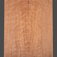 Master-grade redwood guitar top with naturally occurring wave-like patterns for added depth.