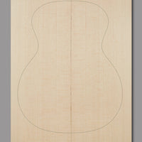 Natural Sitka spruce soundboard with visible grain lines and aged colour tones.