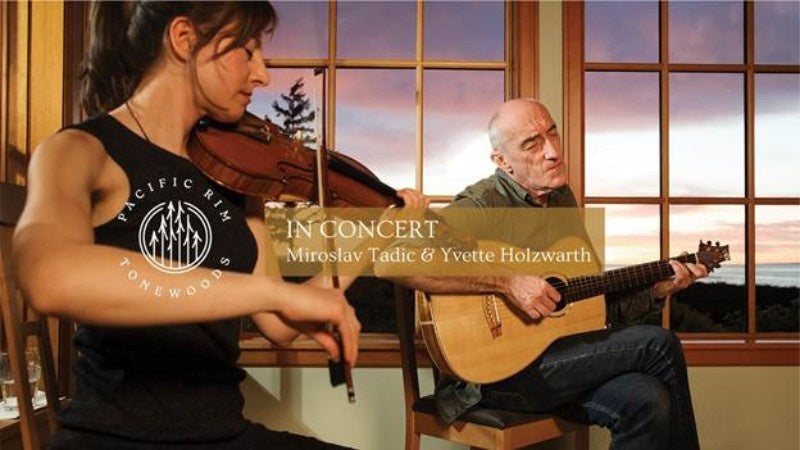 Miroslav Tadic and Yvette Holzwarth performing live at sunset on Lummi Island, WA, in a Pacific Rim Tonewoods-hosted concert blending guitar and violin.