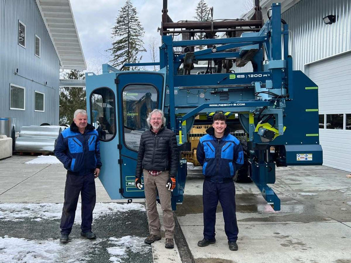  Pacific Rim Tonewoods team standing in front of a new Resch & 3 sawmill at their facility.