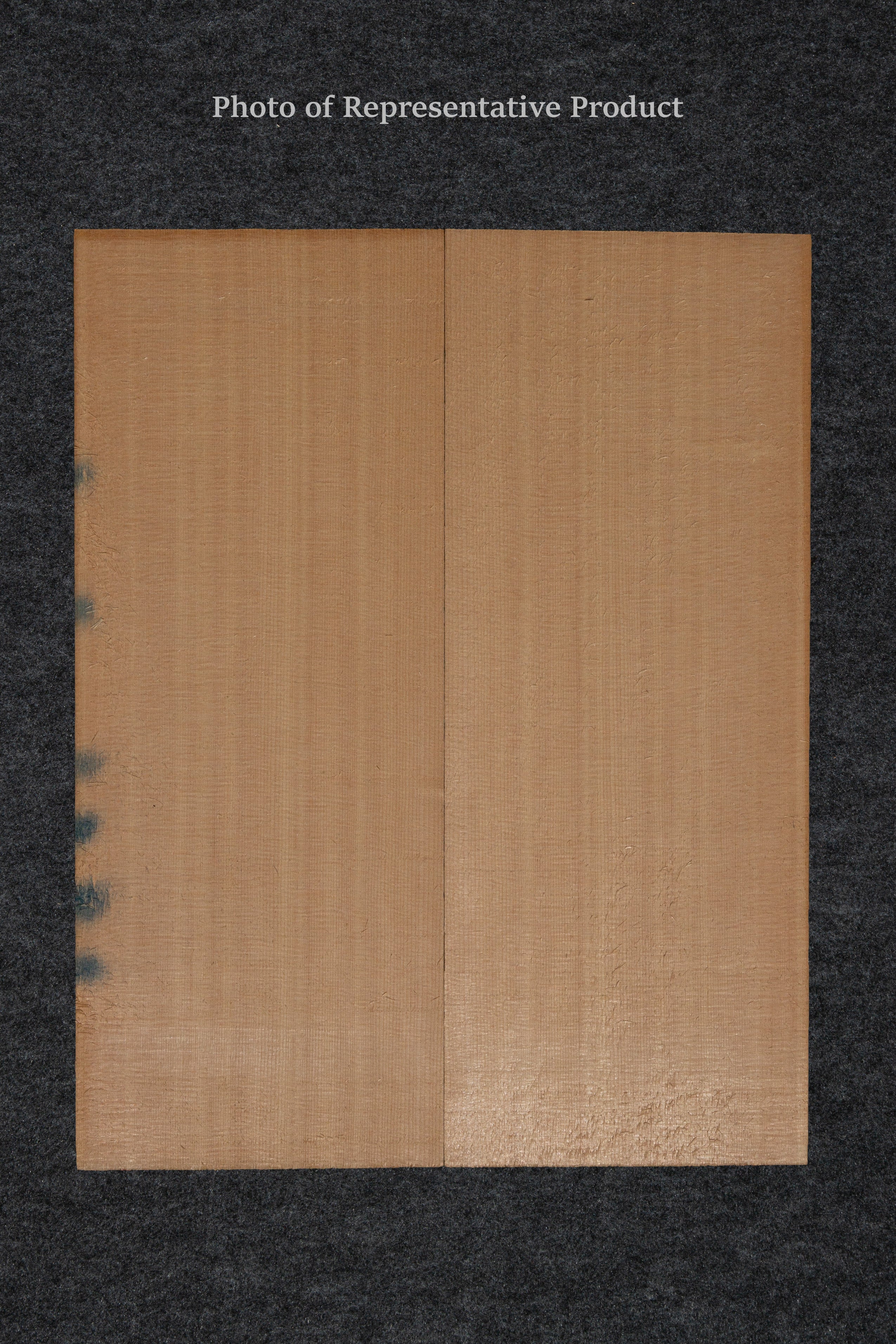Bookmatched archtop guitar top made from finely grained tonewood, offering balanced resonance and clarity for premium acoustic and electric guitar builds.