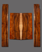 Striking figured koa set with complex flame structure and rich dark hues. Eye-catching pattern enhances any custom acoustic guitar.