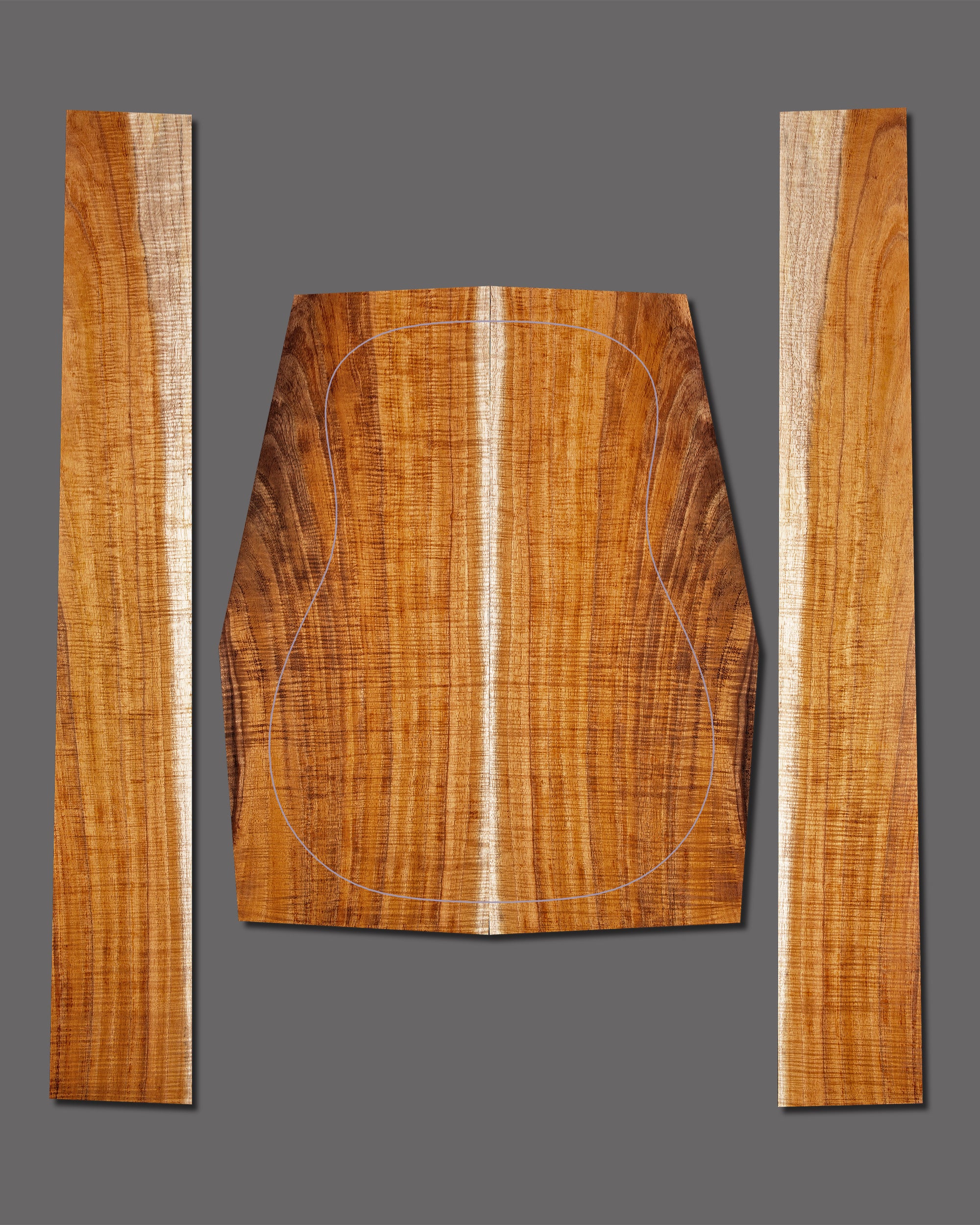 Vibrant figured koa back and side set showcasing intense flame and a glowing centre seam. Bookmatched layout creates visual harmony.