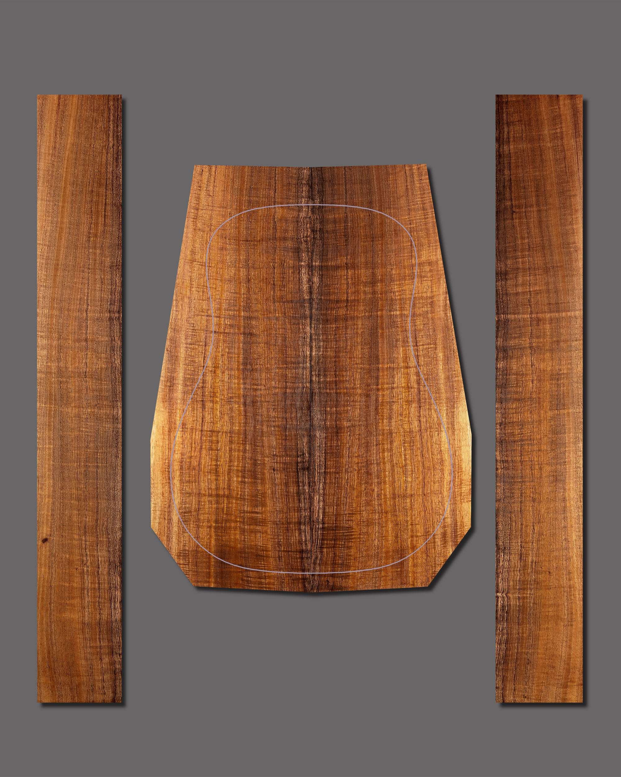 Striking Koa guitar back and side set with rich orange-brown tone and mirrored figuring. Pronounced sapwood along the centre highlights its symmetry.
