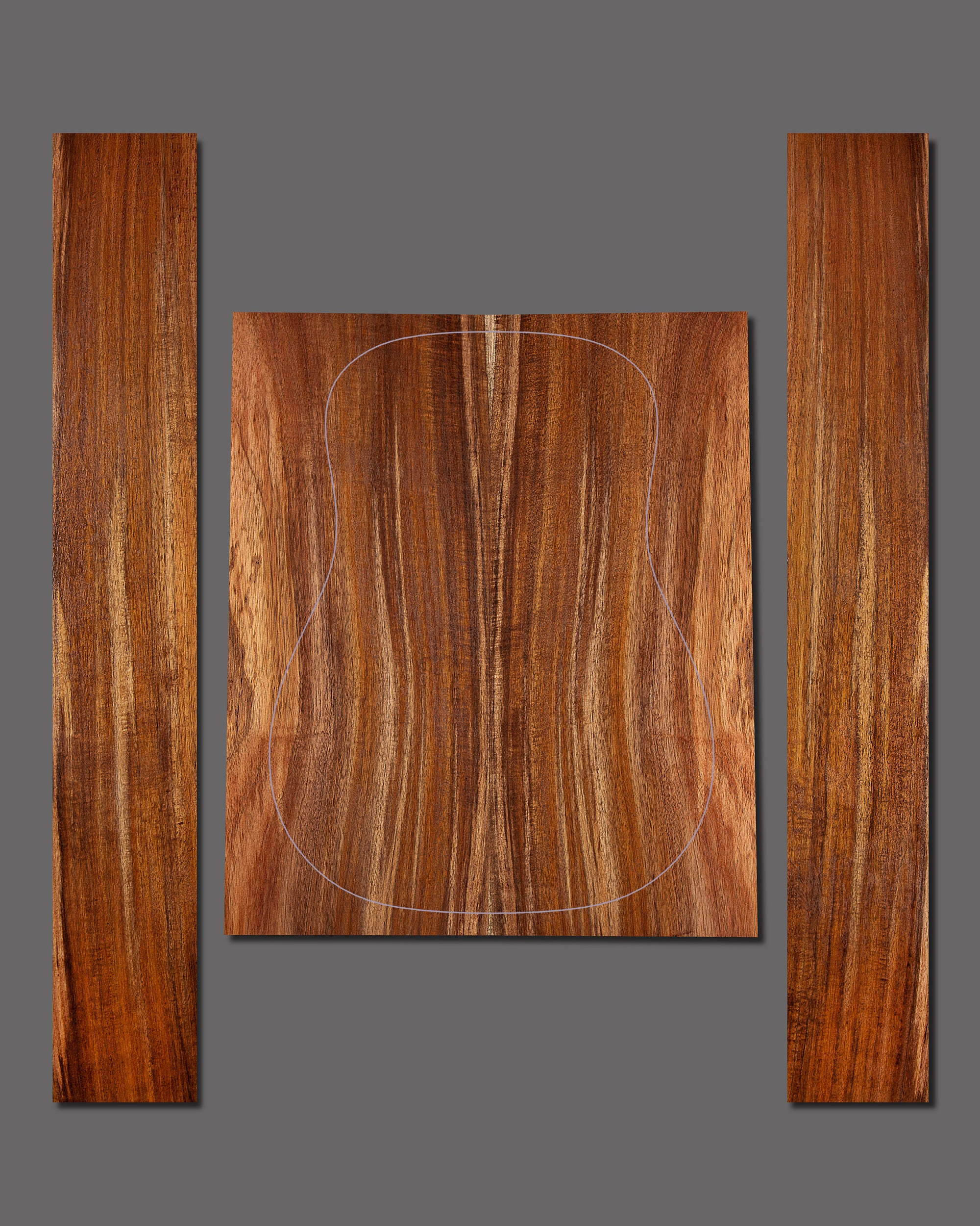 Figured Koa back and side set with warm brown colouring and subtle curl. A natural and organic grain pattern, ideal for understated elegance.