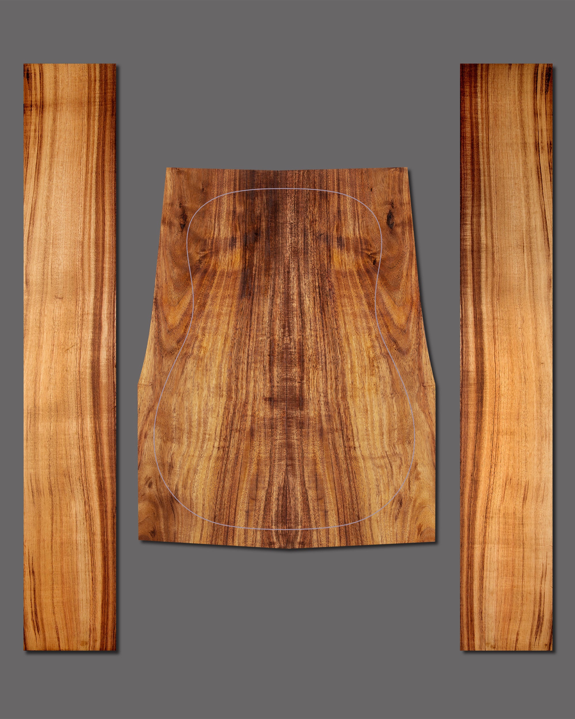 Figured koa back and side set with subtle curl and rustic character. A great tonewood for builders seeking natural beauty and warmth.