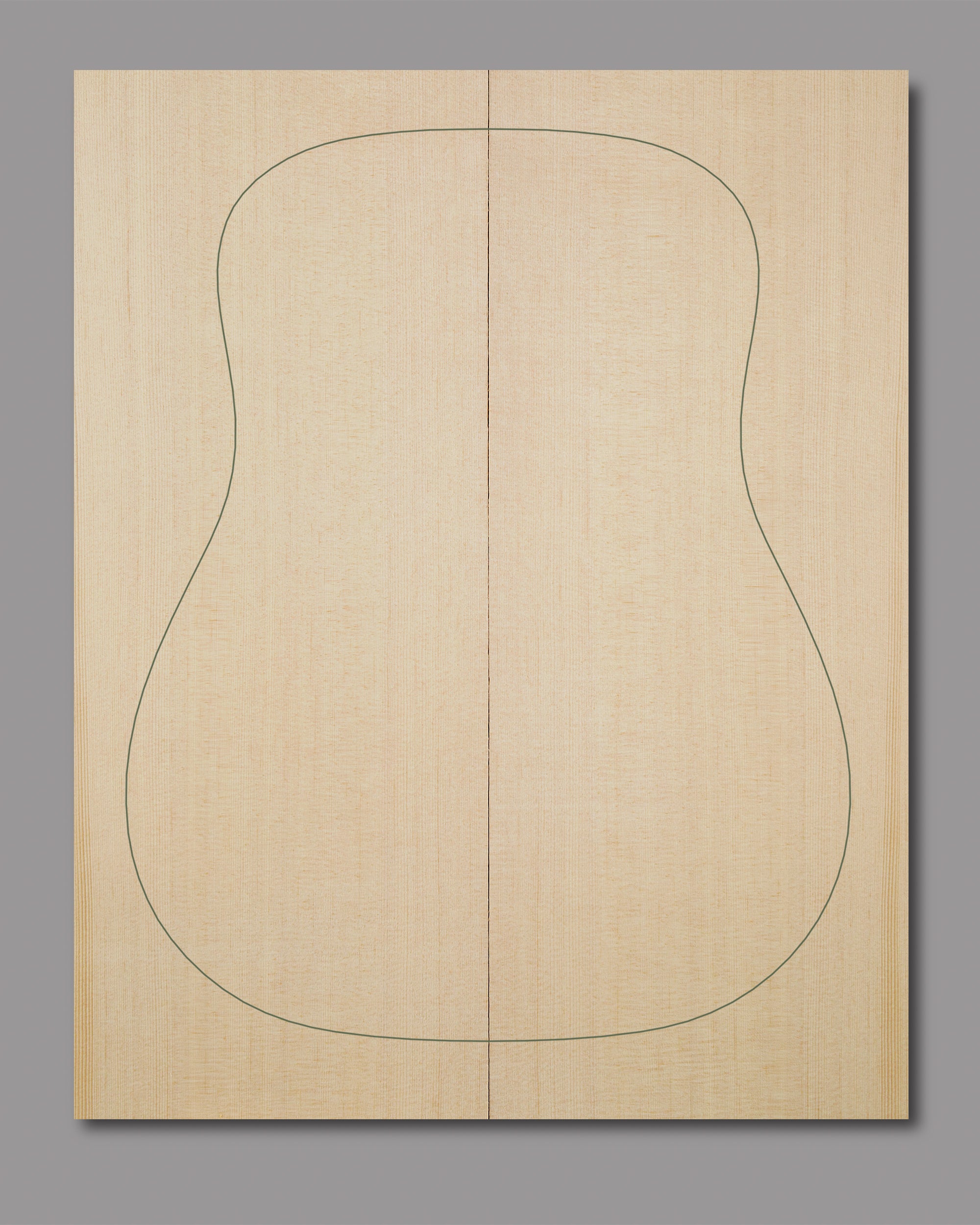 AAAA grade Lutz spruce top featuring fine vertical lines and even colour.
