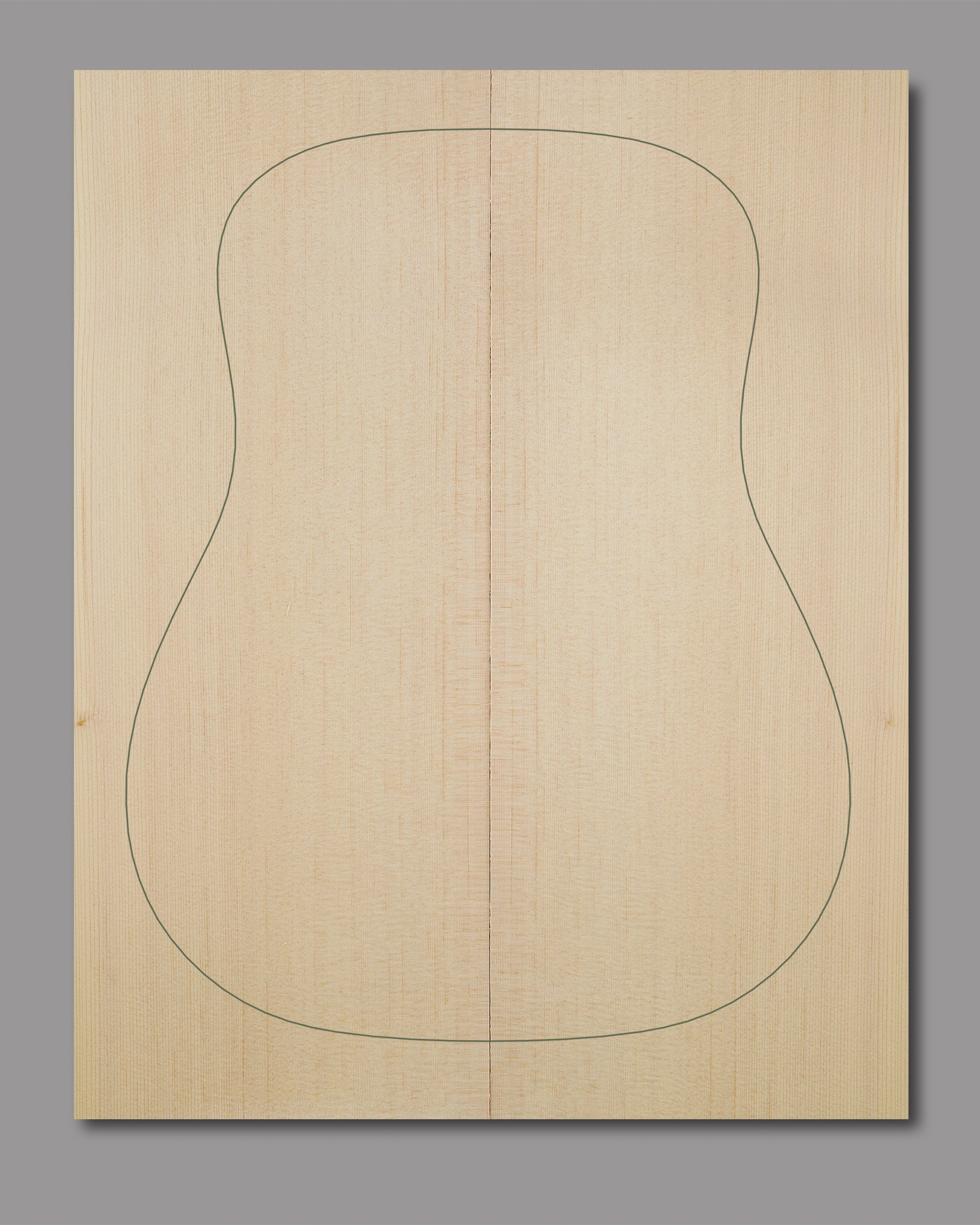 Light-toned Sitka spruce soundboard with harmonious grain, perfect for dreadnought guitars.