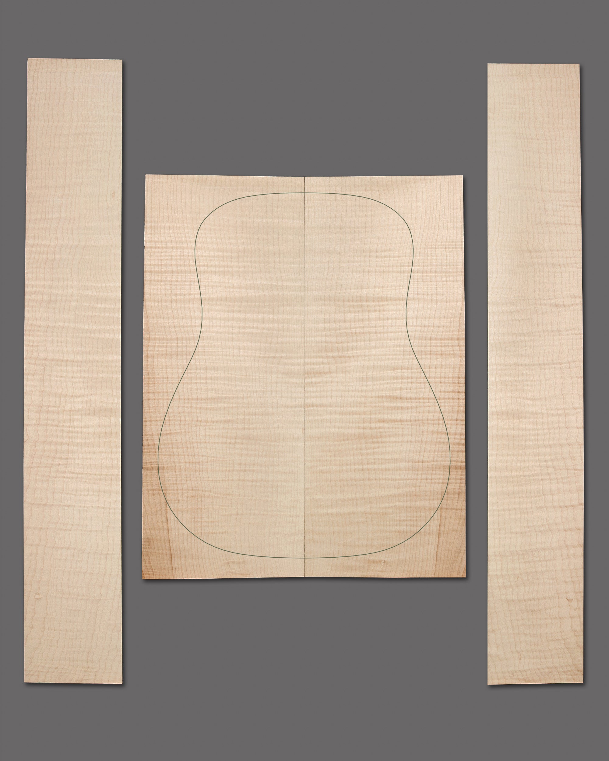 Classic figured maple with visible flame striping and neutral colour. A versatile choice for guitar back and sides.