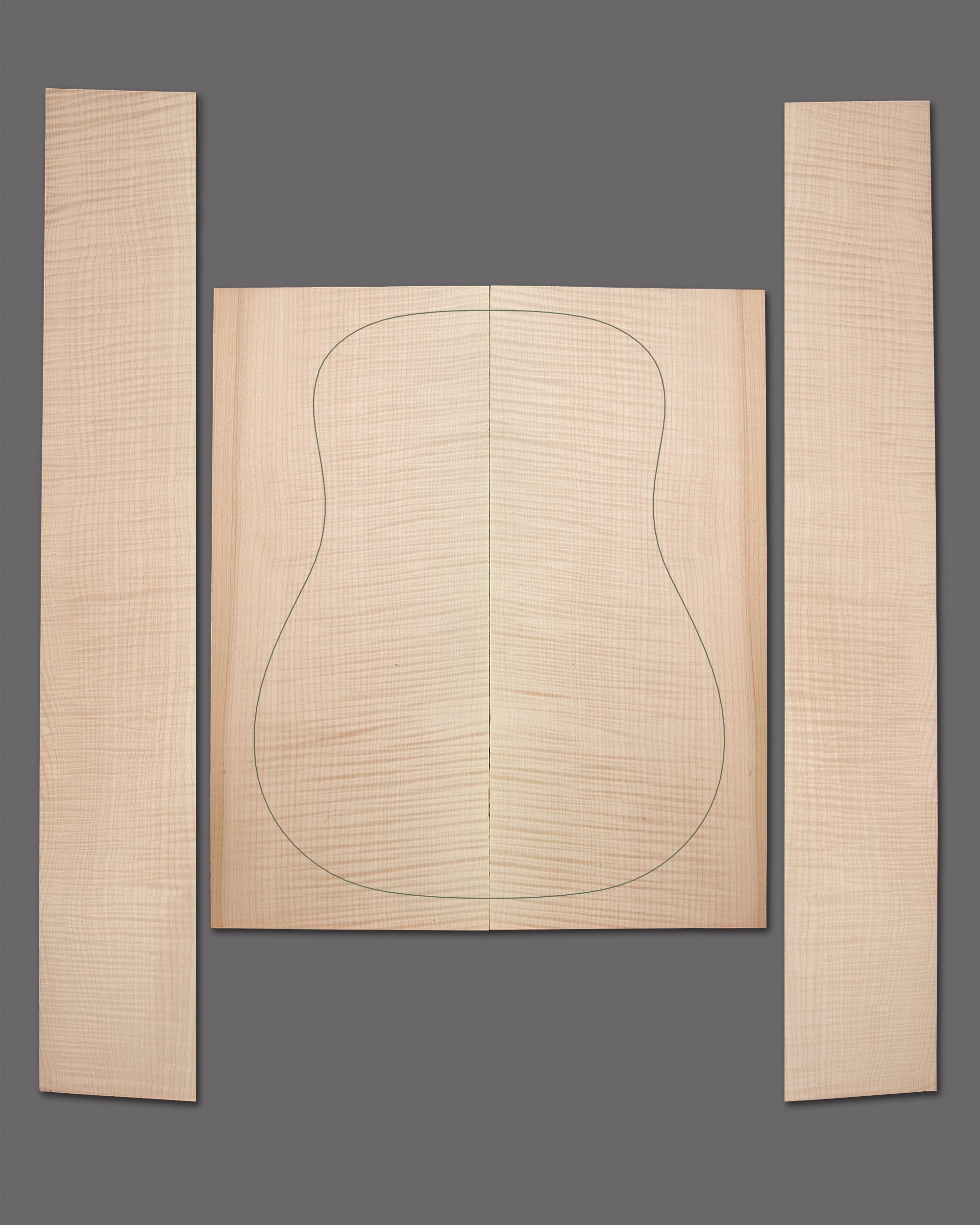 Premium figured maple with shimmering flame figure and golden undertones. Aesthetic symmetry ideal for high-grade acoustic builds.