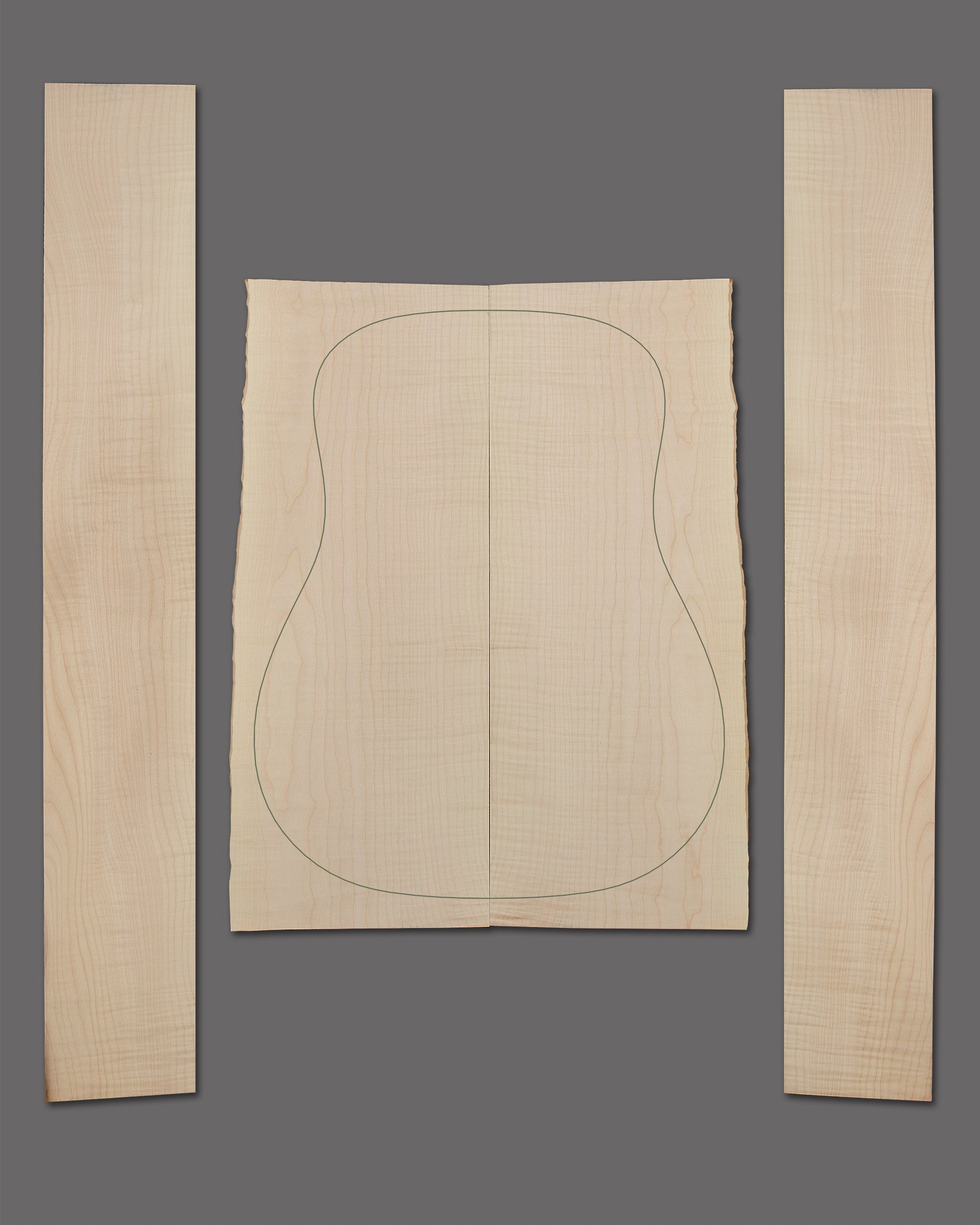 Classic figured maple with visible flame striping and neutral colour. A versatile choice for guitar back and sides.