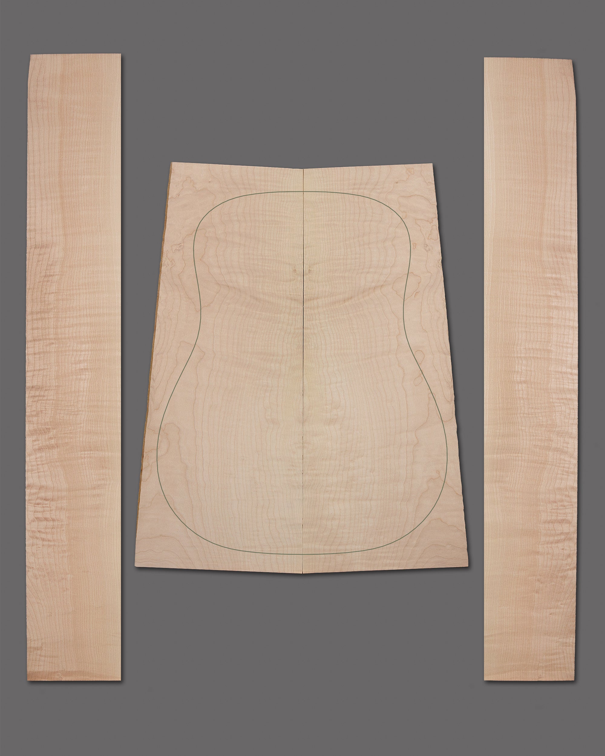 Curly maple guitar back and sides set with flowing figure and subtle shading. Symmetrical layout highlights the natural beauty.