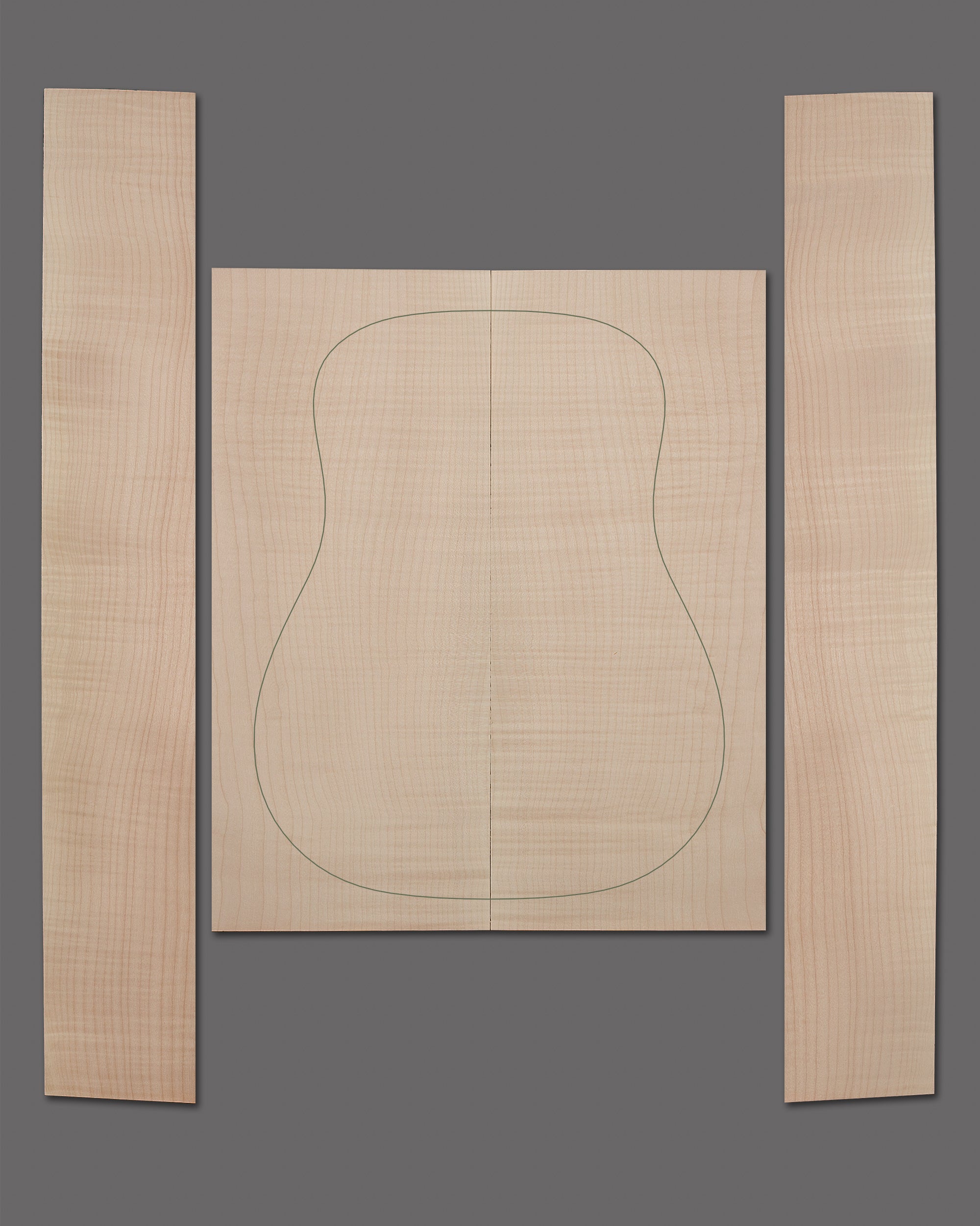 Lightly figured maple with a gentle flame and smooth colour gradient. Balanced, bookmatched set for acoustic guitars.