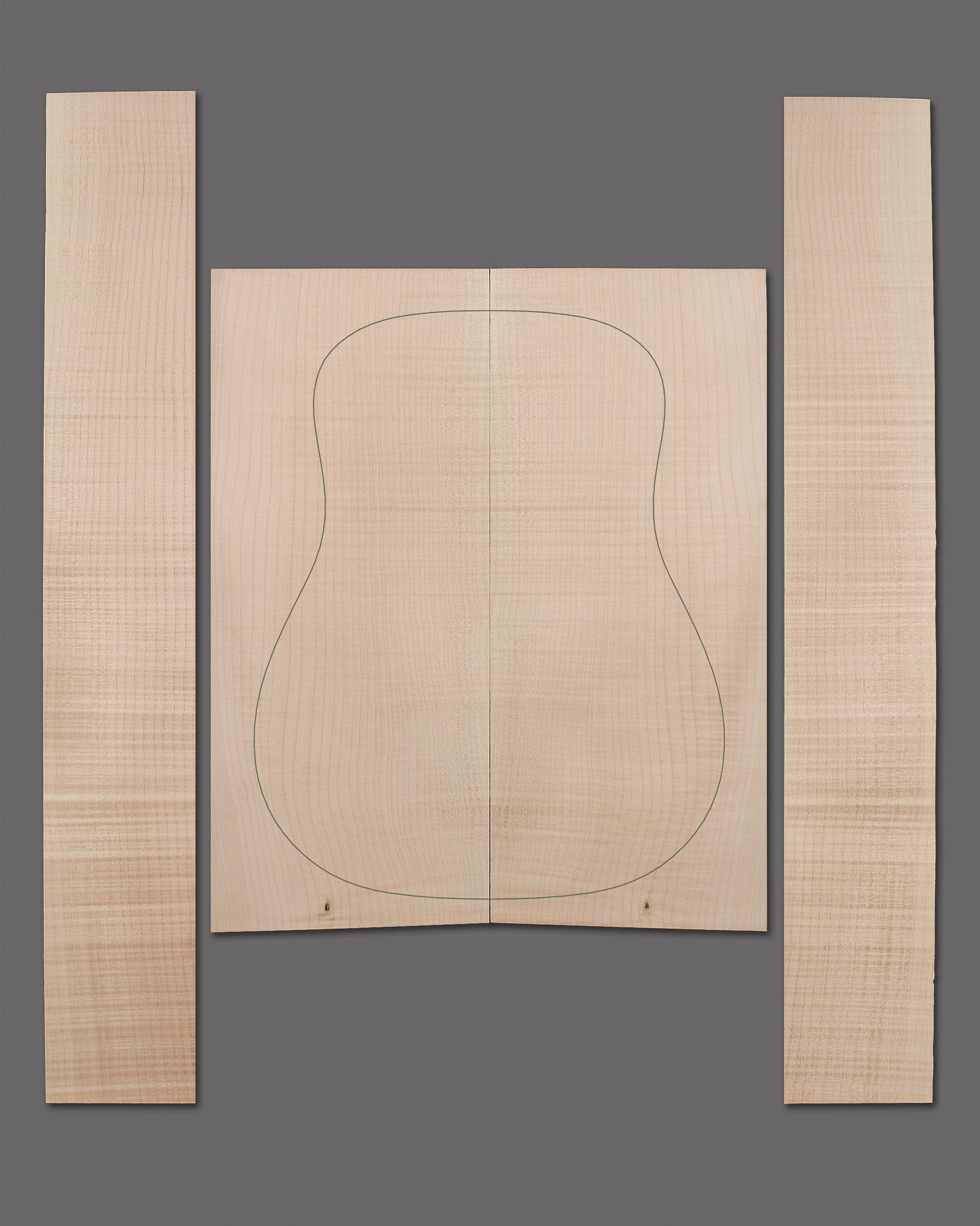 Subtle flame maple guitar back and sides set with even figure and natural hue, ideal for refined acoustic tone.