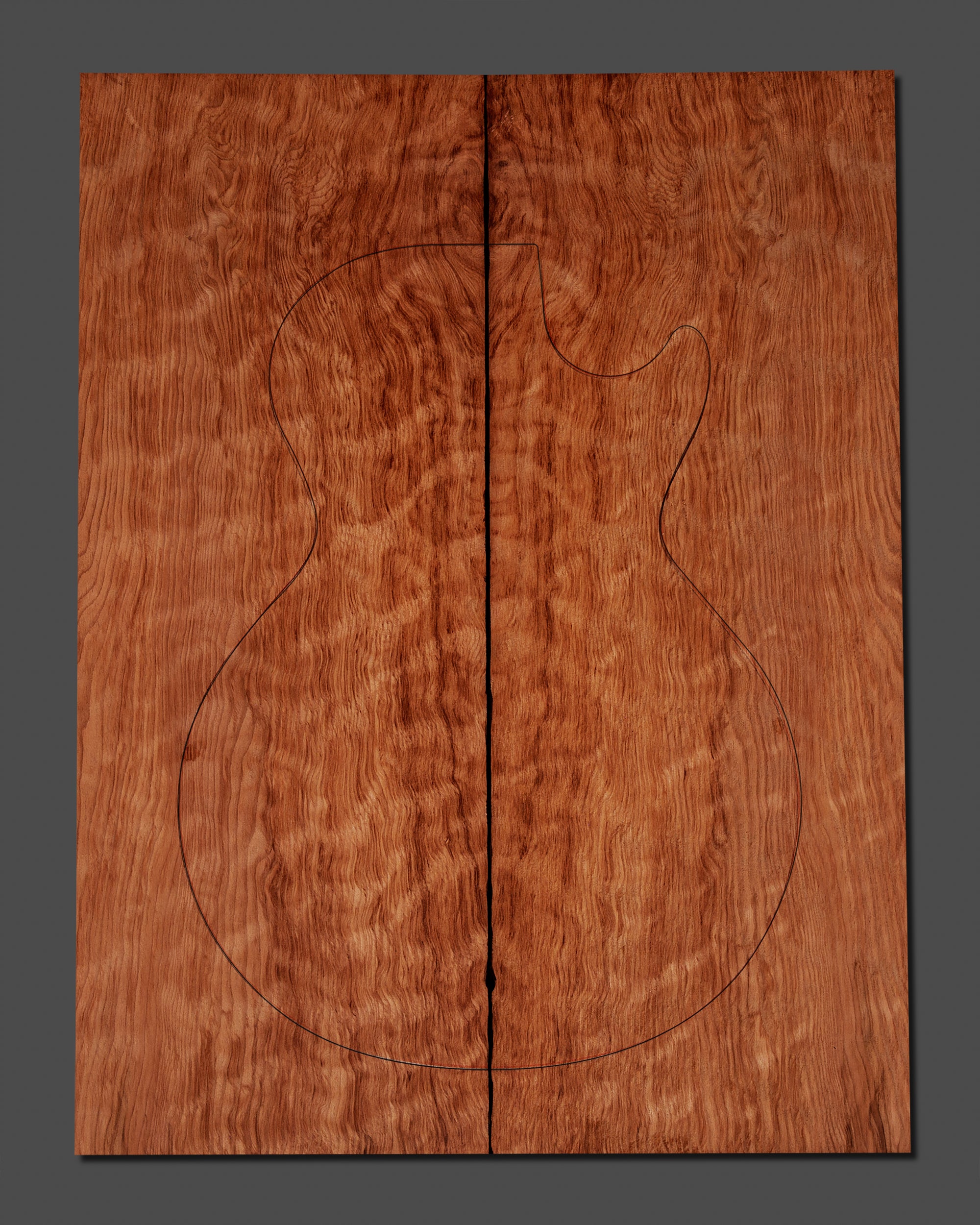 Premium figured redwood electric guitar top with deep, wavy grain patterns and rich color variation. Ideal for high-end custom builds with a bold aesthetic.