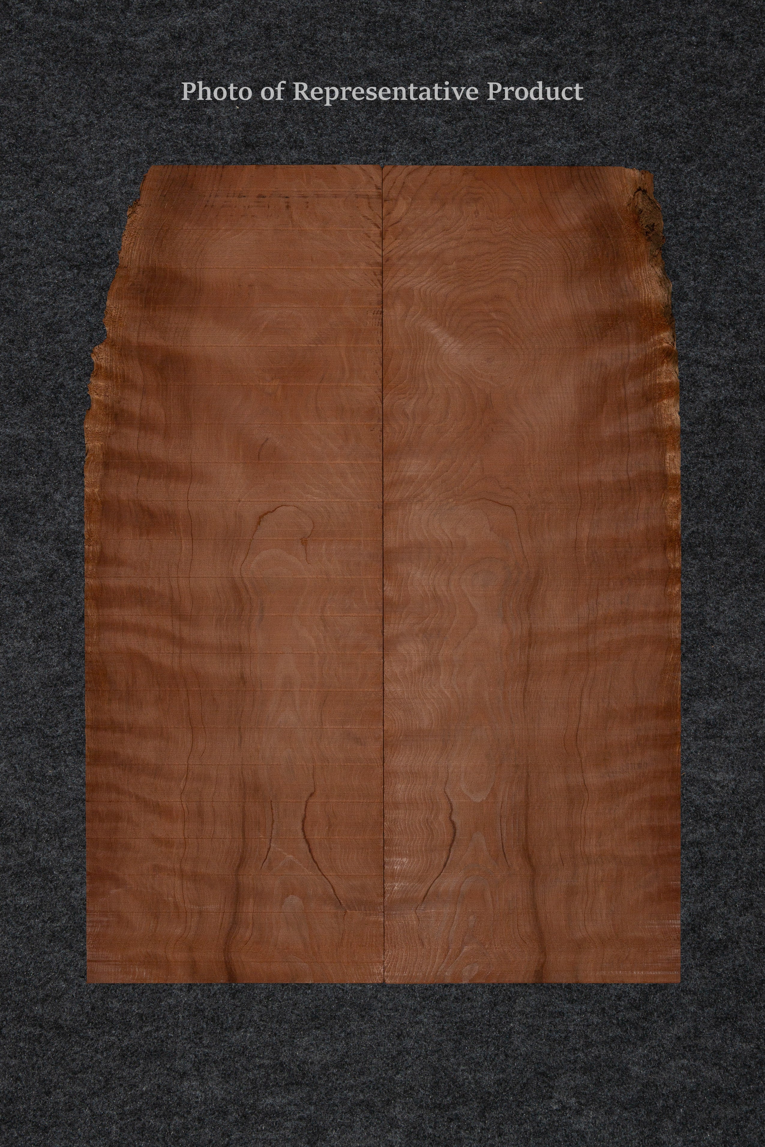 A bookmatched redwood soundboard with a warm reddish-brown hue, displaying subtle figure and grain, ideal for crafting high-quality mandolins.