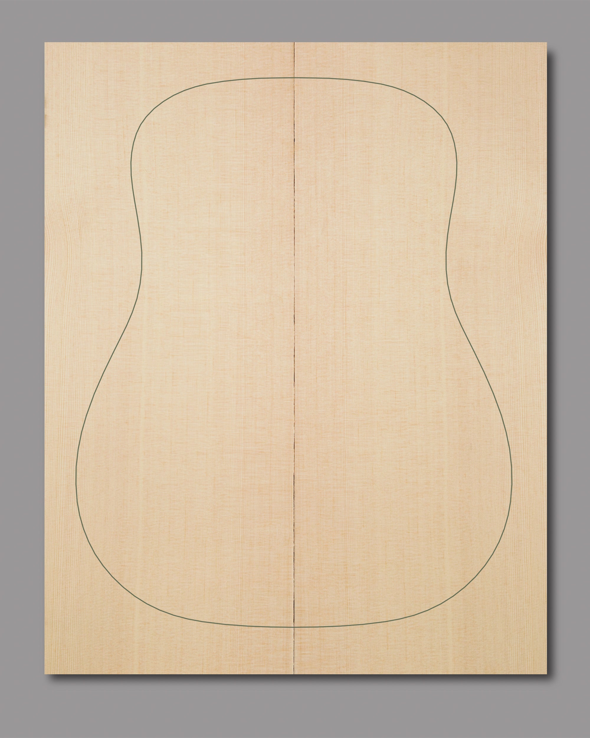 Sitka spruce top with tight vertical grain and mirror-like bookmatch, sonically evaluated.