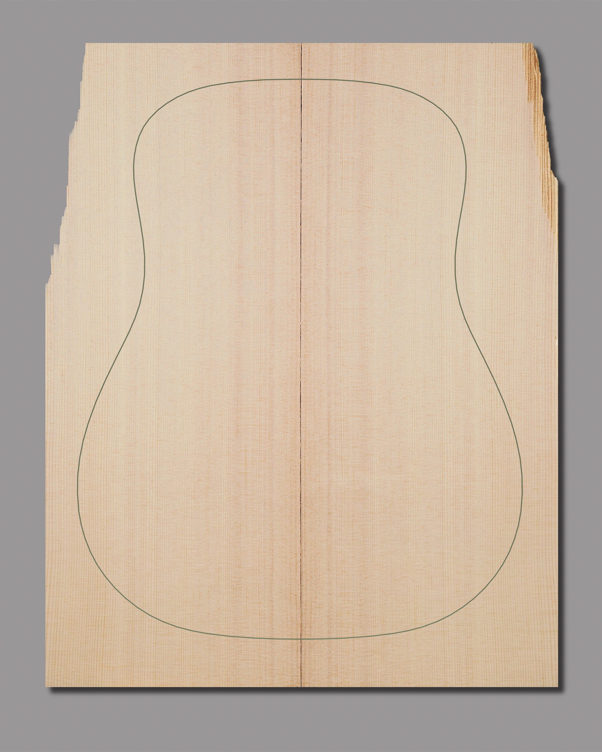 Sitka spruce top with elegant vertical lines and tonal consistency, sonically approved.