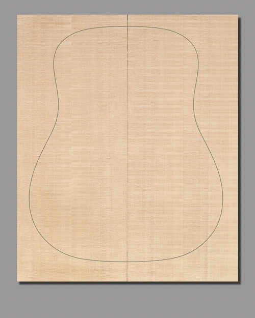 Handcrafted slipmatched Sitka spruce soundboard, highlighting organic wood figure with light color variations.