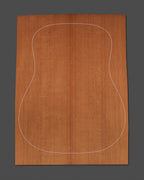 Premium thermally modified soundboard with optimized acoustic properties and a warm hue. Designed for high-performance guitar construction.