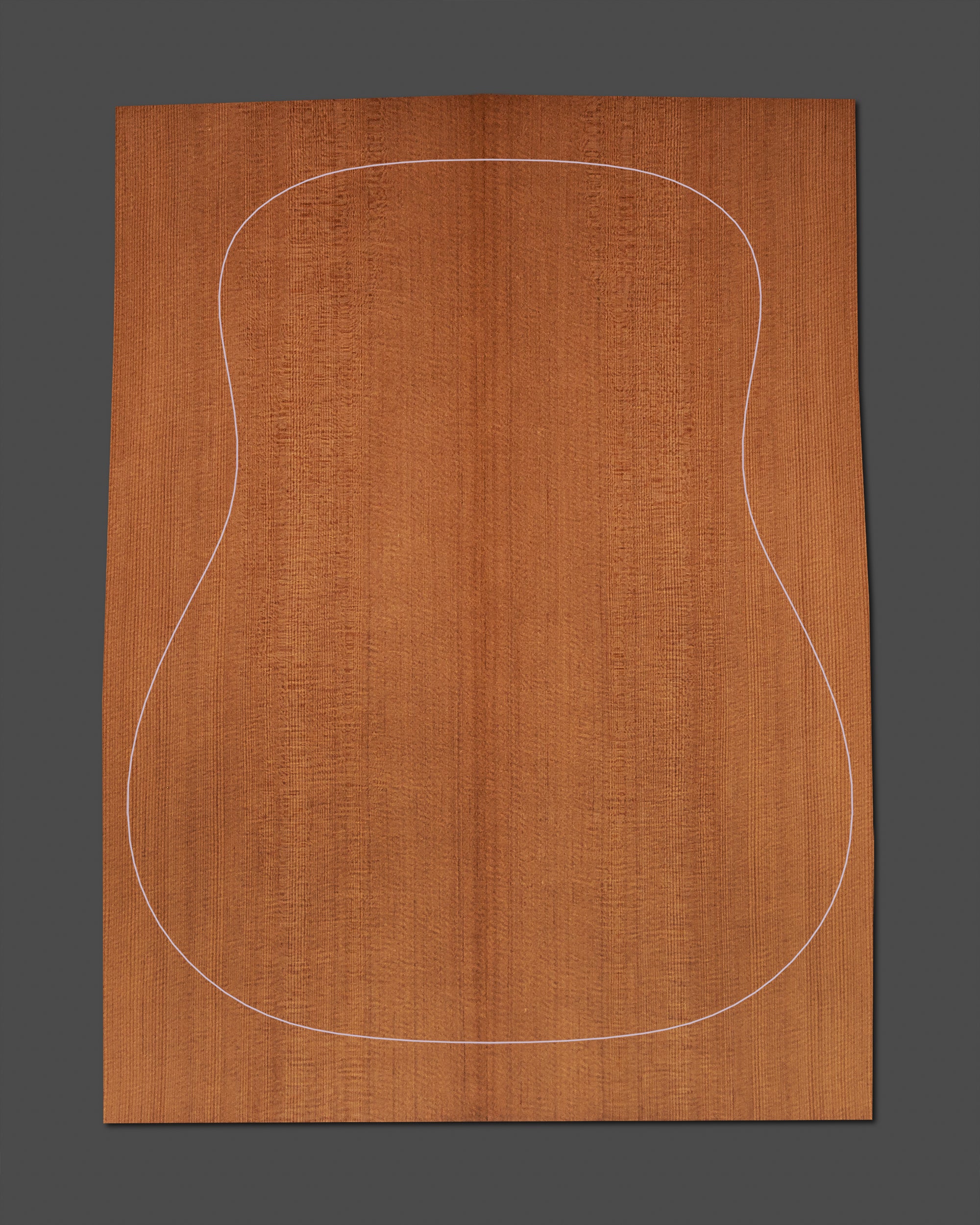 Premium thermally modified soundboard with optimized acoustic properties and a warm hue. Designed for high-performance guitar construction.
