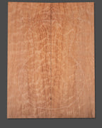 Master-grade redwood guitar top with naturally occurring wave-like patterns for added depth.