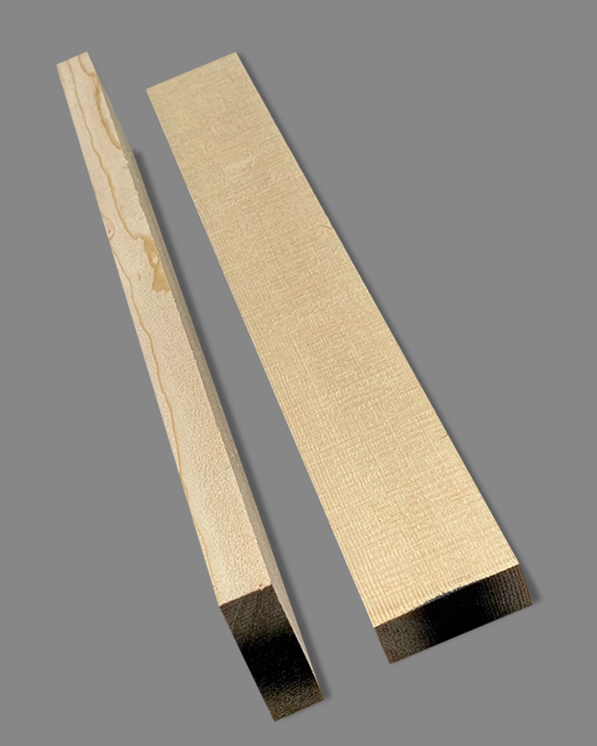 Two quartersawn Sitka spruce bracing billets with tight, even grain. Ideal for acoustic guitar top reinforcement and tonal clarity.
