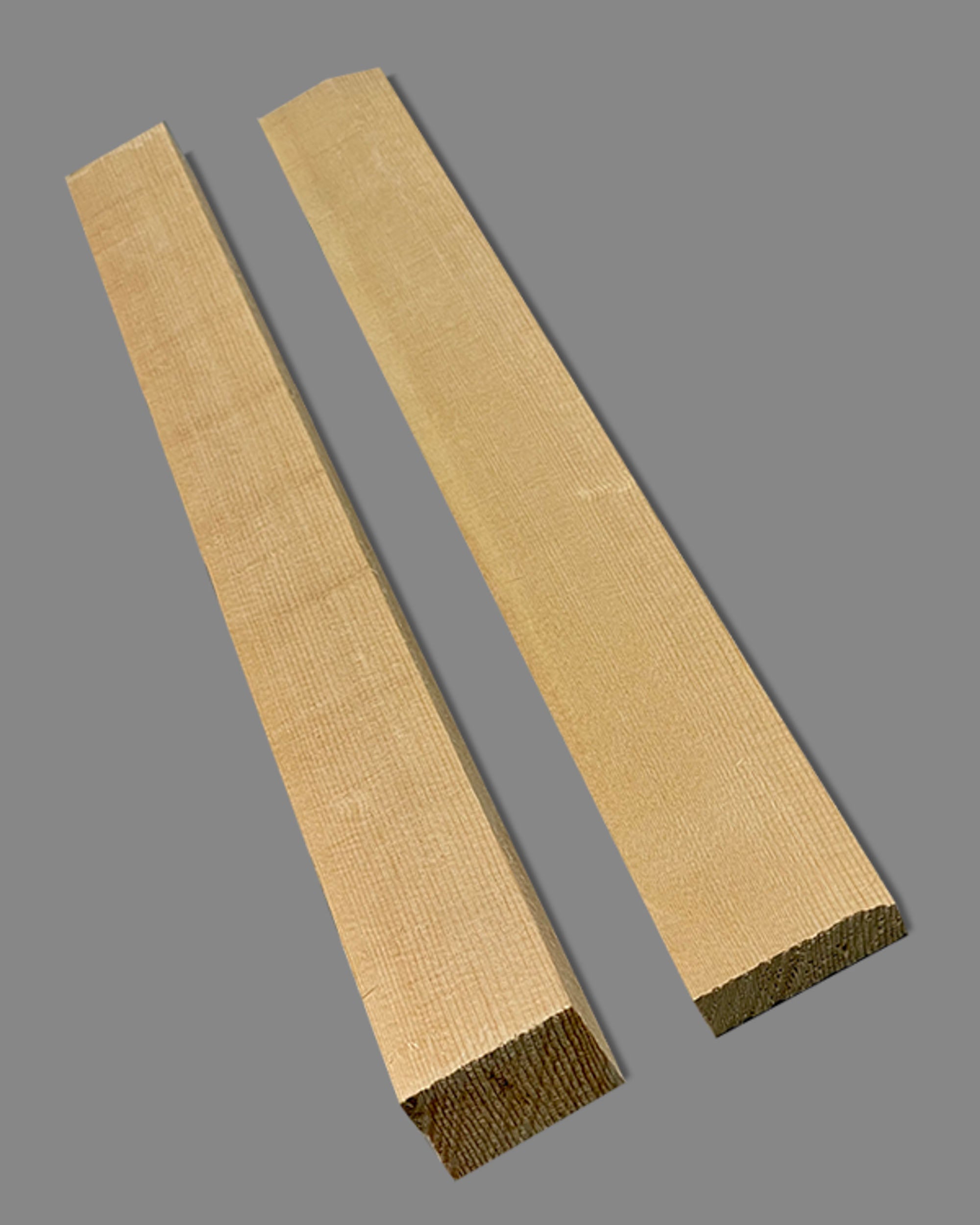 Two Sitka spruce bracing billets with tight, straight grain. Ideal for guitar top bracing due to strength, stability, and acoustic responsiveness.