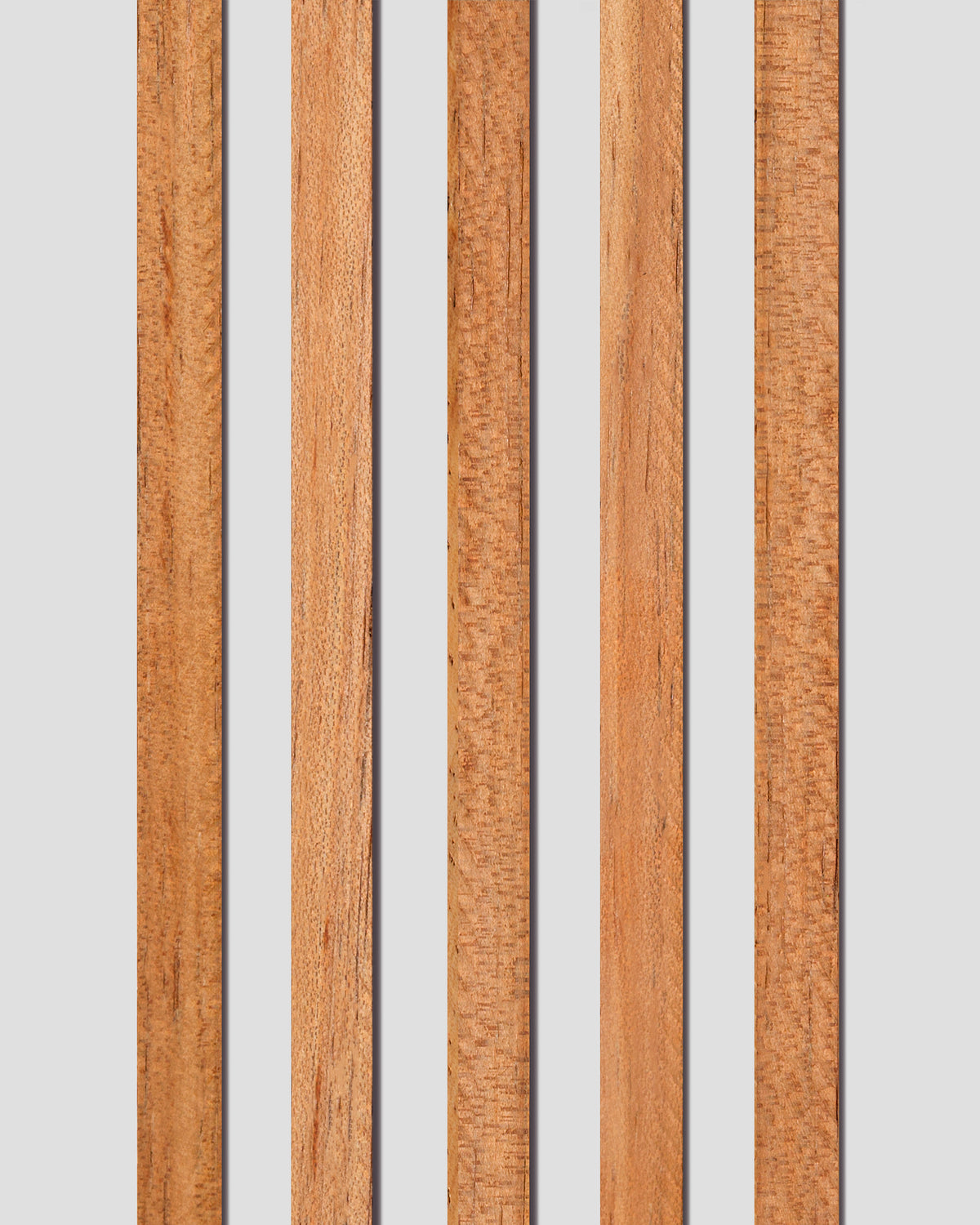 Five plain koa wood binding strips in varying grain patterns, showcasing natural colour variation and subtle figure. Ideal for adding a warm, traditional look to acoustic guitars.
