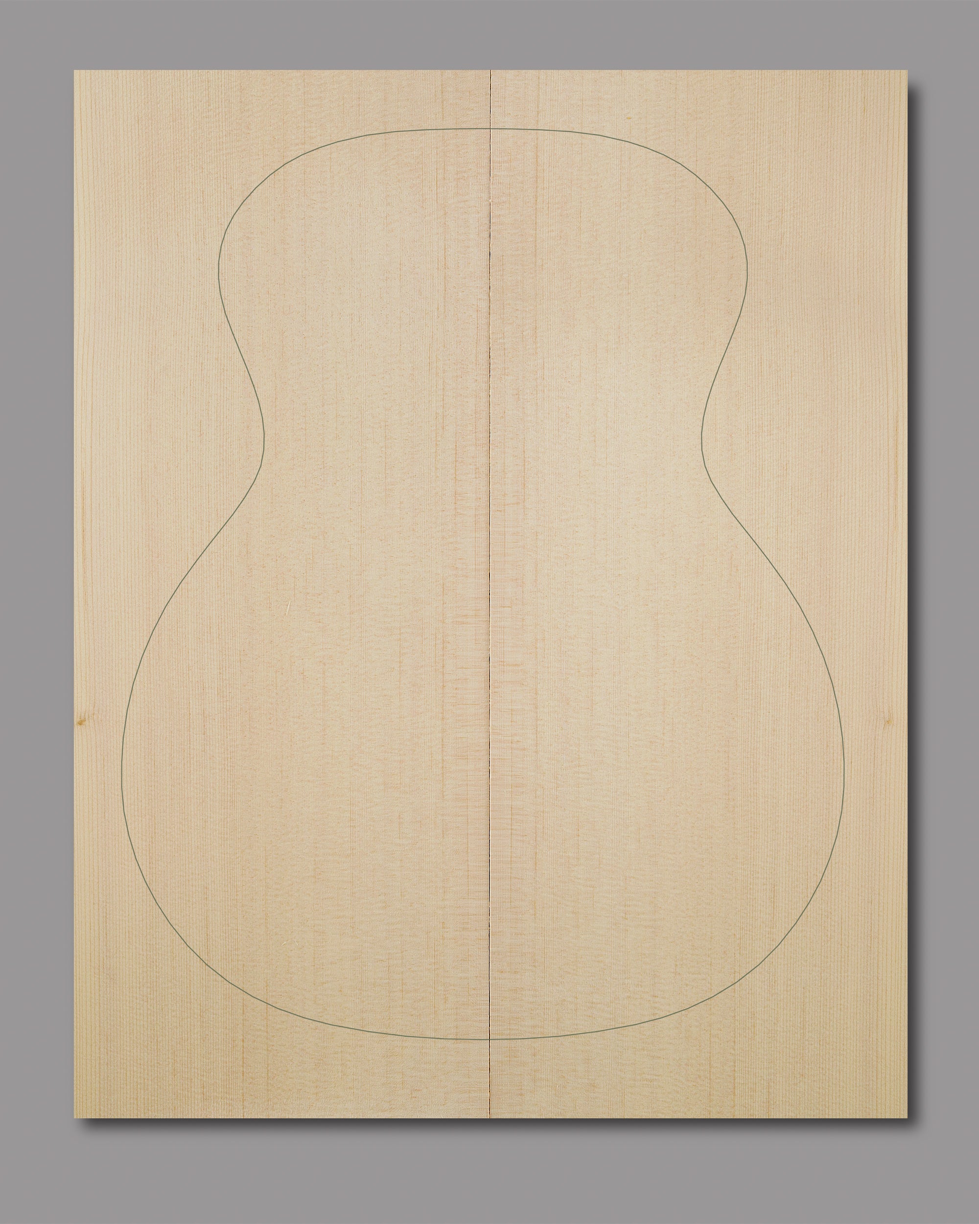 Lutz spruce guitar top with soft golden tone and evenly spaced grain. A traditional soundboard for warm acoustic tone.