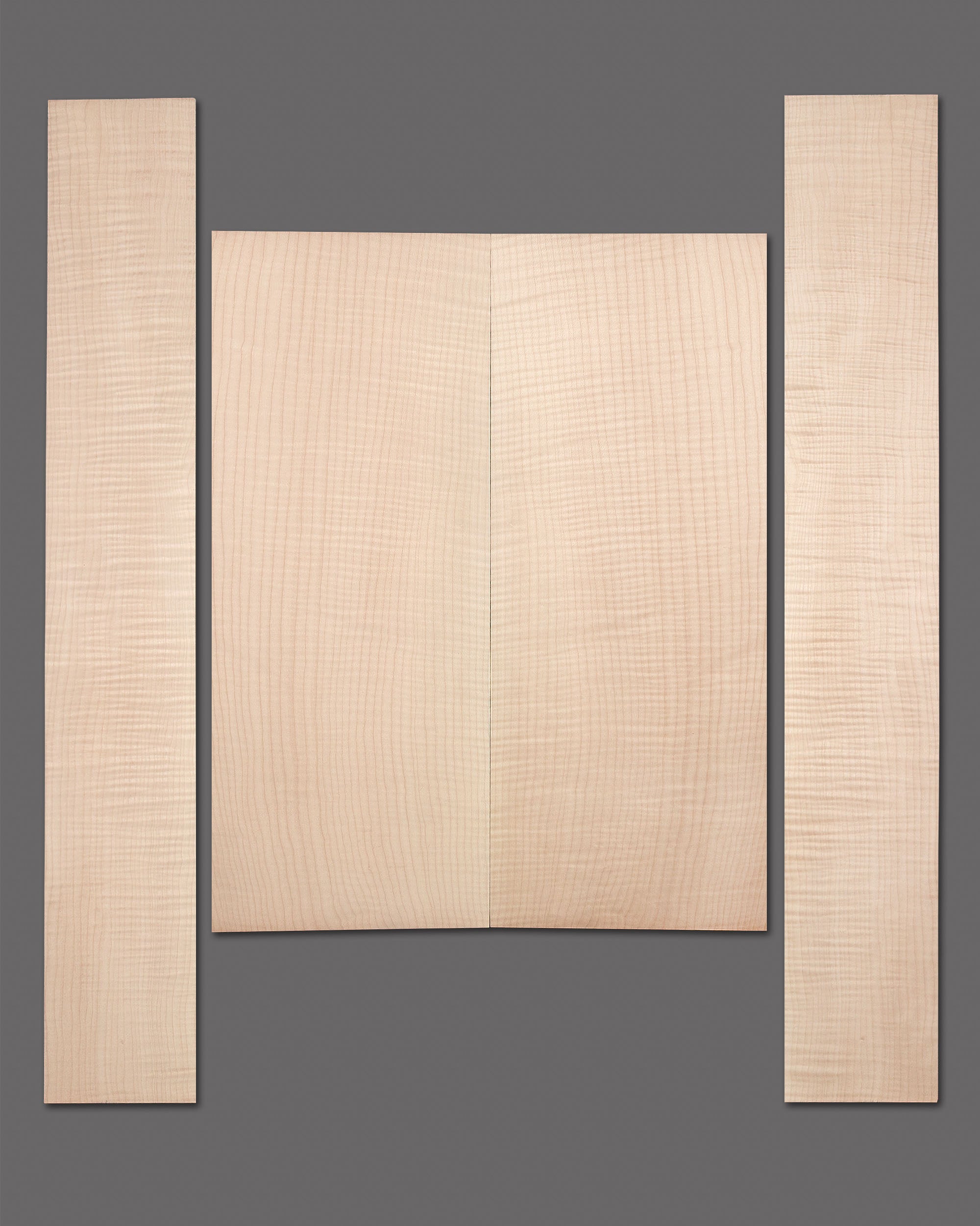AAAA-grade figured maple back and side set with tight, even flame. Creamy colour and strong visual symmetry make it ideal for high-end guitars.