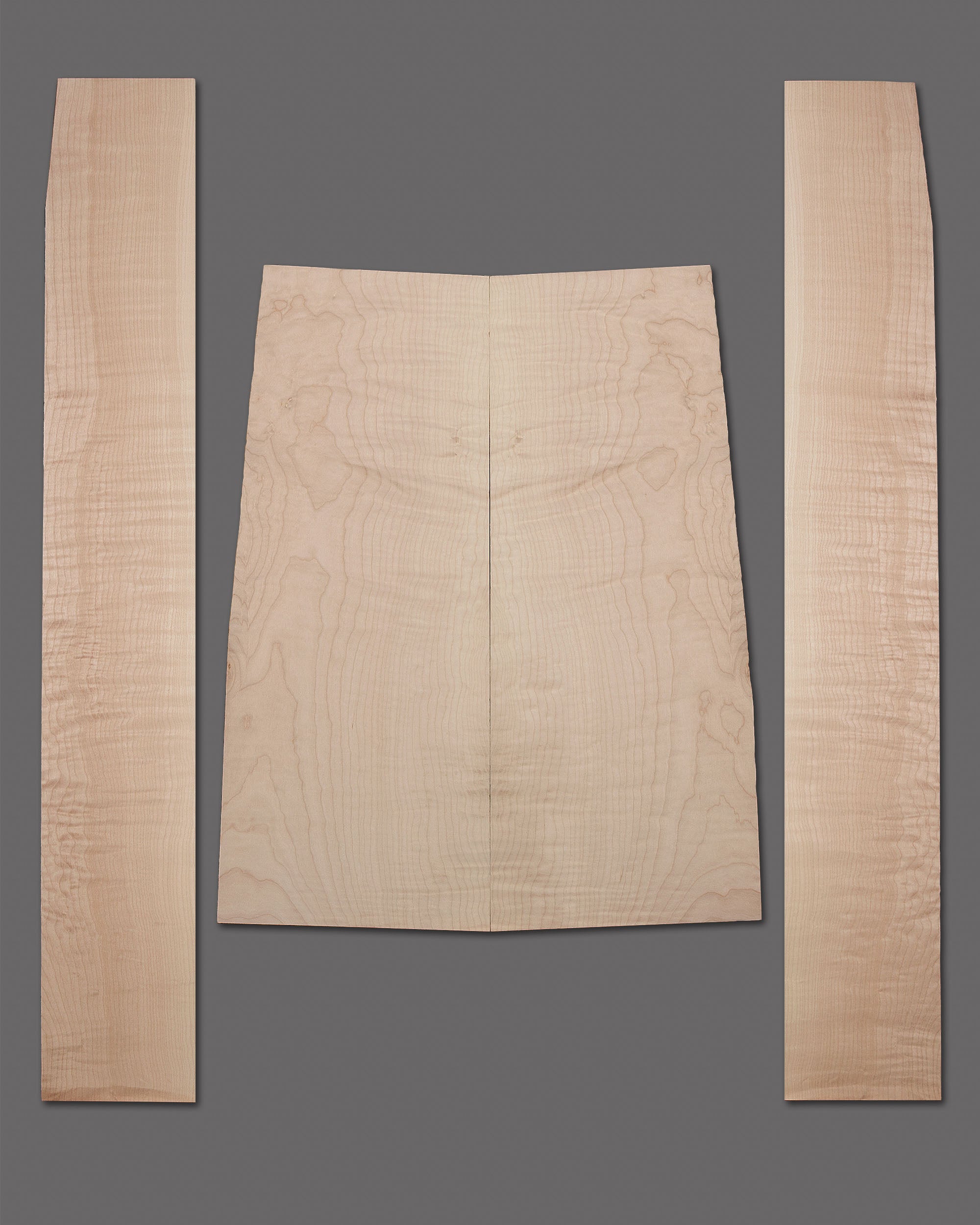 AAA-grade figured maple back and side set featuring wavy curl and subtle quilting. Light natural tone with consistent figure throughout.
