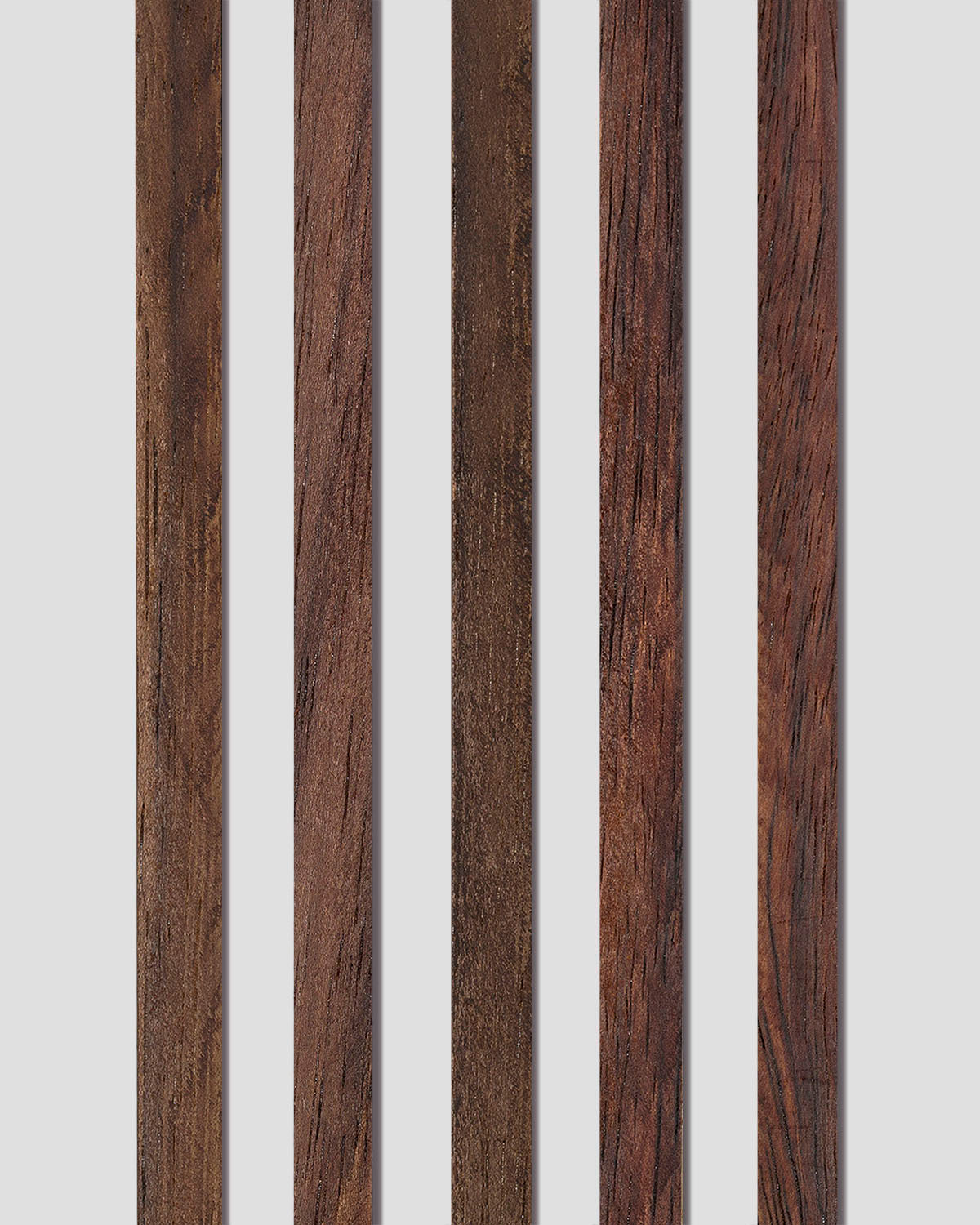 Close-up of five Indian rosewood binding strips showcasing the rich, natural colour variation and subtle grain patterns in each piece.