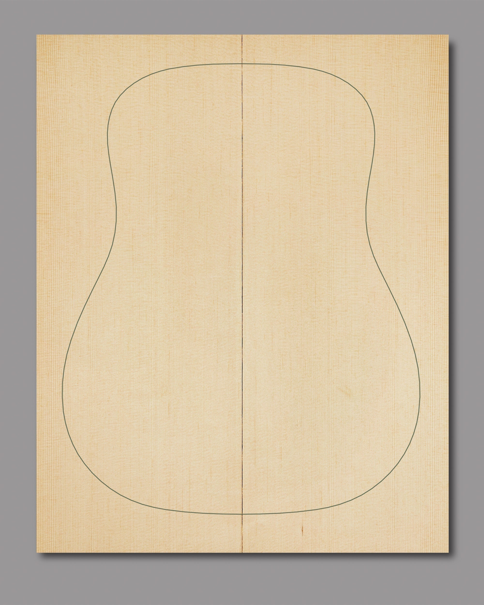 Bookmatched Sitka spruce soundboard with subtle crossgrain shimmer, optimised for balance between clarity and sustain.