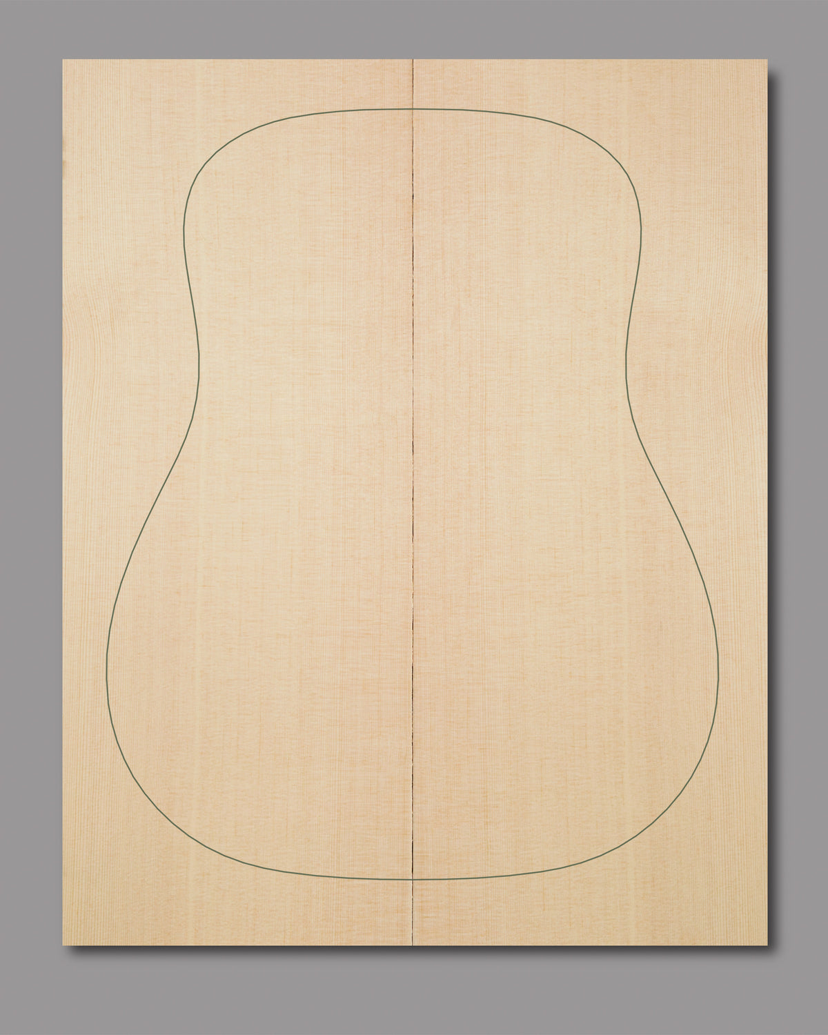 Natural Sitka spruce top with slight curl in outer grain lines and even texture, crafted for clarity and warmth in acoustic builds.
