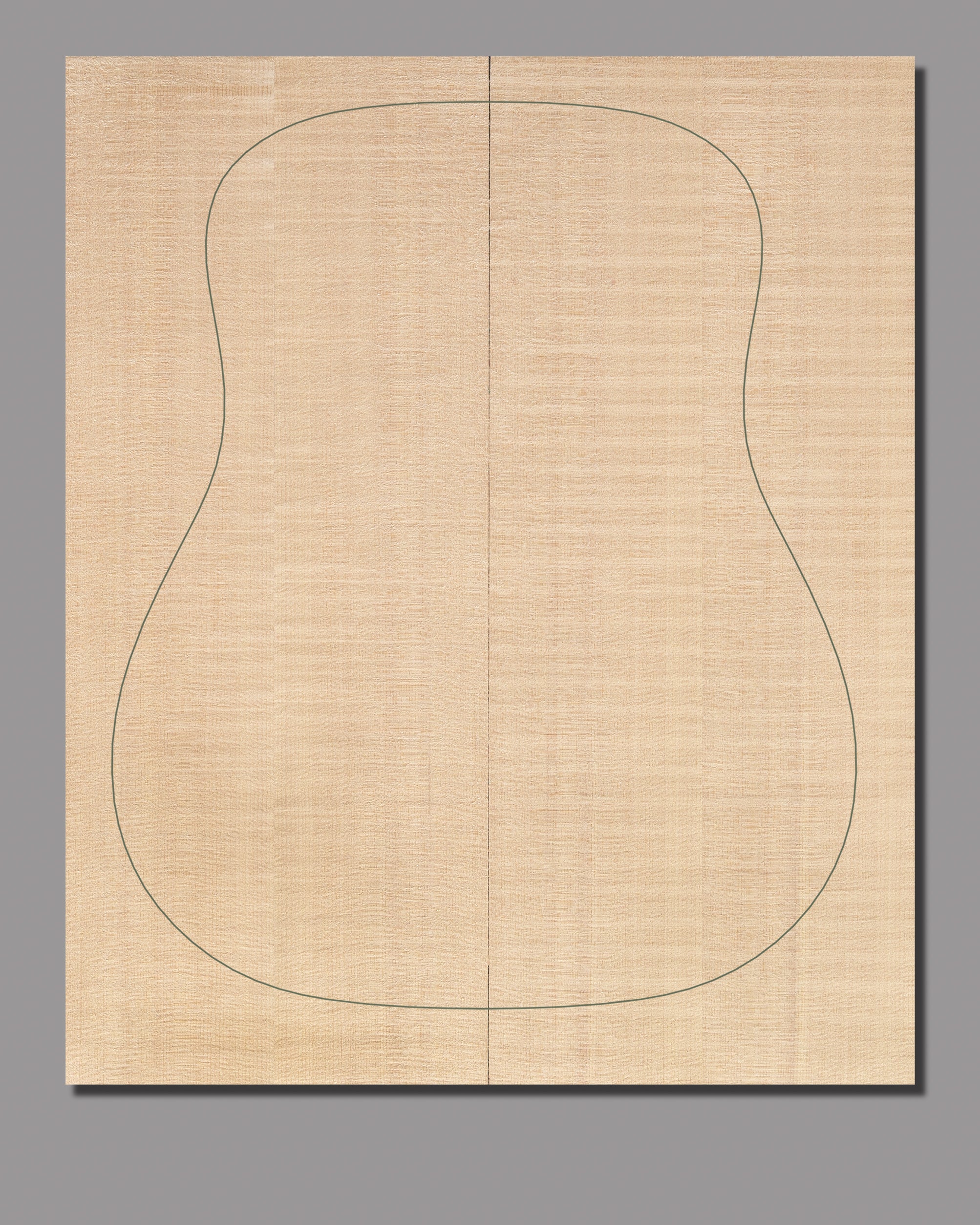 Slipmatched Sitka spruce top with tight grain spacing and subtle color variations, ensuring a rich, dynamic tone.